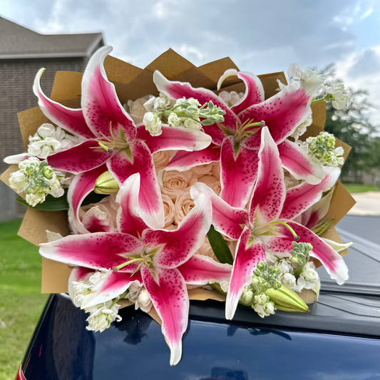 25 roses + lilies
